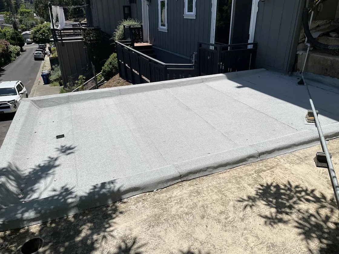 Finished flat roof laid behind a Bay Area home
